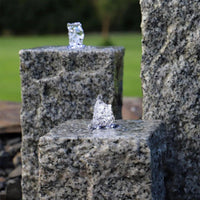 Granit Springbrunnen LED Gartenbrunnen Naturstein